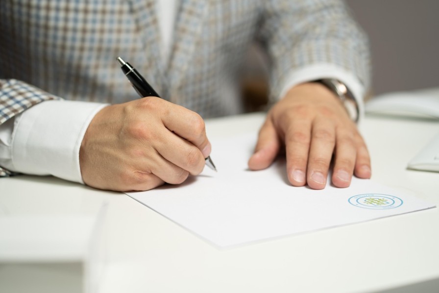 Accountant recording an AML review note for an existing client