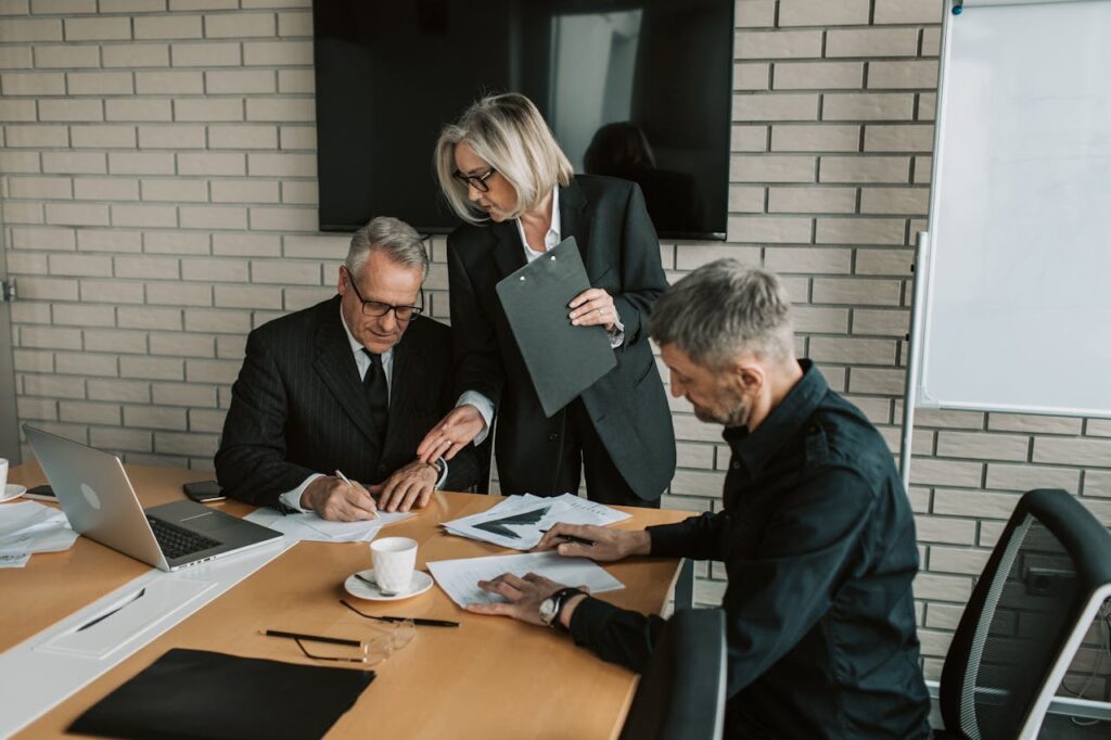 Accountancy firm reviewing client documents after a beneficial ownership change