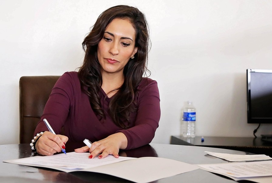 Accountant reviewing client due diligence records for an existing client
