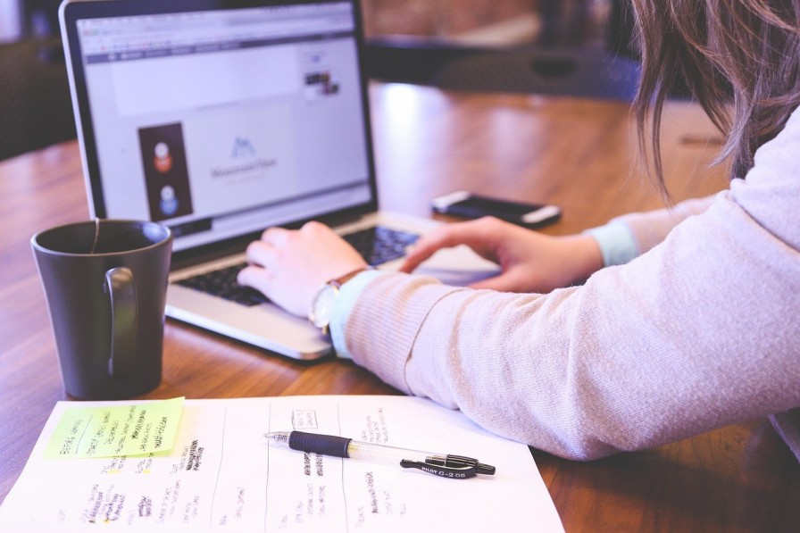 Accountant reviewing client records as part of ongoing AML monitoring