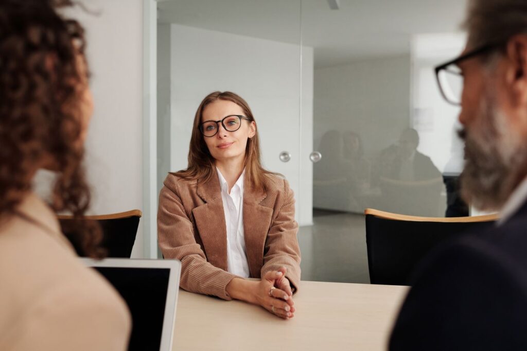 Professional interview setting representing AML employee screening and suitability checks in an accountancy firm.
